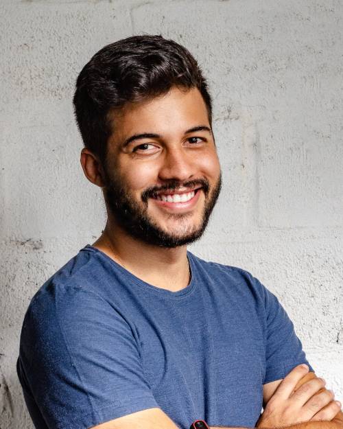 Picture of a man in a blue t-shirt. Photo by Italo Melo from Pexels.