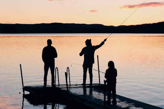 Three people fishing. Photo by Olle from Pexels